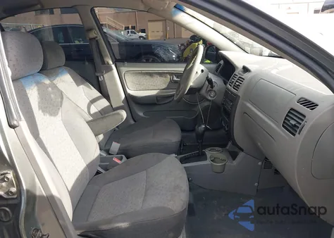 2005 Kia Rio из США, поврежденный, VIN KNADC125756375988